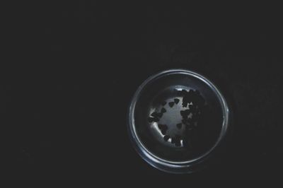 High angle view of drink against black background