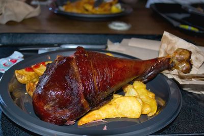 Close-up of cooked turkey leg served in plate