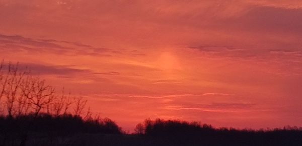 Scenic view of dramatic sky during sunset