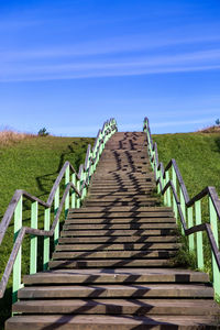 Old wooden stairs on the mountain fall day in belarus