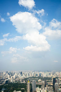 High angle view of city buildings against sky