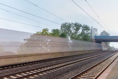 Railway tracks against sky