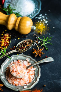 High angle view of spices and seasonings on table