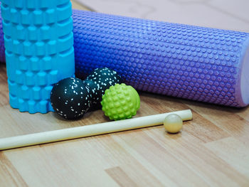 Close-up of multi colored balls on table