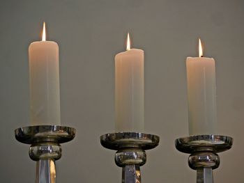 Close-up of burning candles