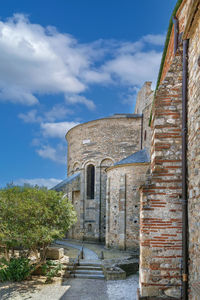 Low angle view of old building against sky