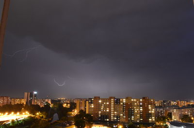 Cityscape against sky at night