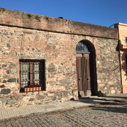 Exterior of old building against clear sky