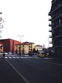 View of city street against clear sky