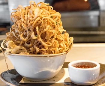 Close-up of noodles in bowl on table