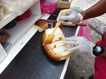 Midsection of woman preparing food