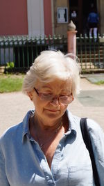 Portrait of woman with sunglasses outdoors