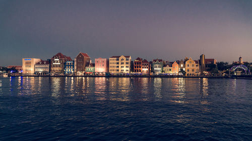 View of city lit up at night