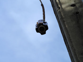 Low angle view of lamp against sky