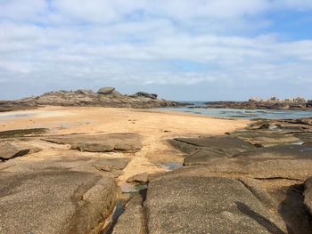 Scenic view of rocks on beach in brittany 