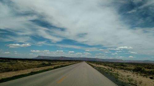 Country road passing through landscape