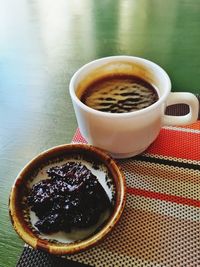 Close-up of coffee cup on table