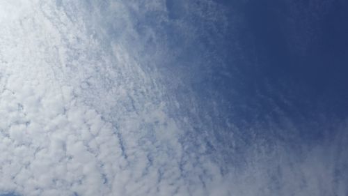 Close-up of snow against sky