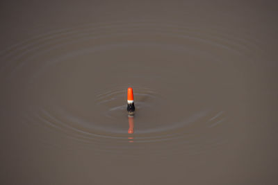 High angle view of depth marker in water