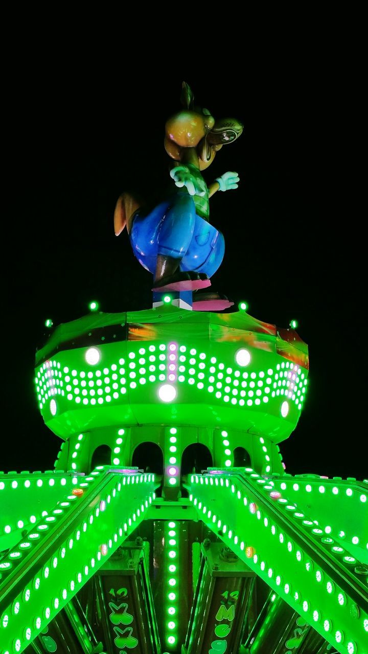 LOW ANGLE VIEW OF ILLUMINATED TREE