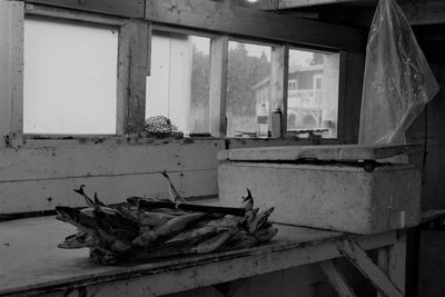 Frozen fish on a wood table
