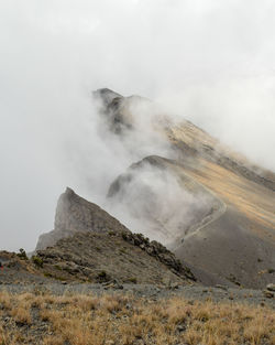 Scenic view of mountains against sky, mount meru, arusha national park, tanzania 