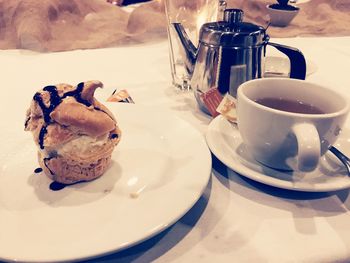 High angle view of coffee cup on table