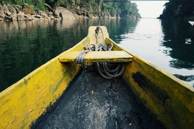 High angle view of yellow boat in river