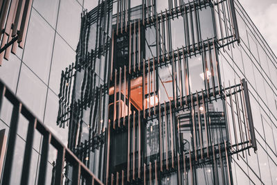 Low angle view of modern building against sky