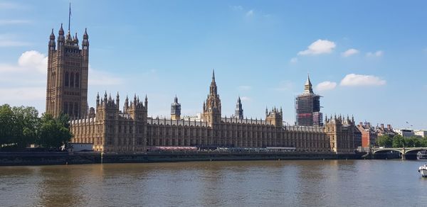 The house of parliament and river thames viewed from the south bank in london, england.
