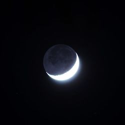 Low angle view of moon in sky