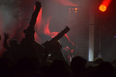 People enjoying music concert