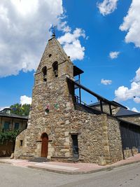 Low angle view of historic building against sky