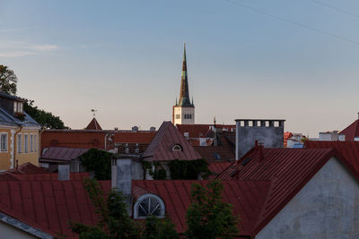 Panoramic view of buildings in city against sky