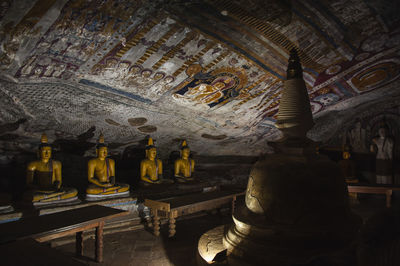 Statue of temple in building
