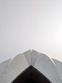 Low angle view of lotus temple against clear sky