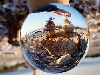 Close-up of hand holding glass