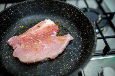 Close-up of meat on barbecue grill