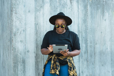 Young woman using mobile phone