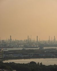 High angle view of buildings against sky during sunset