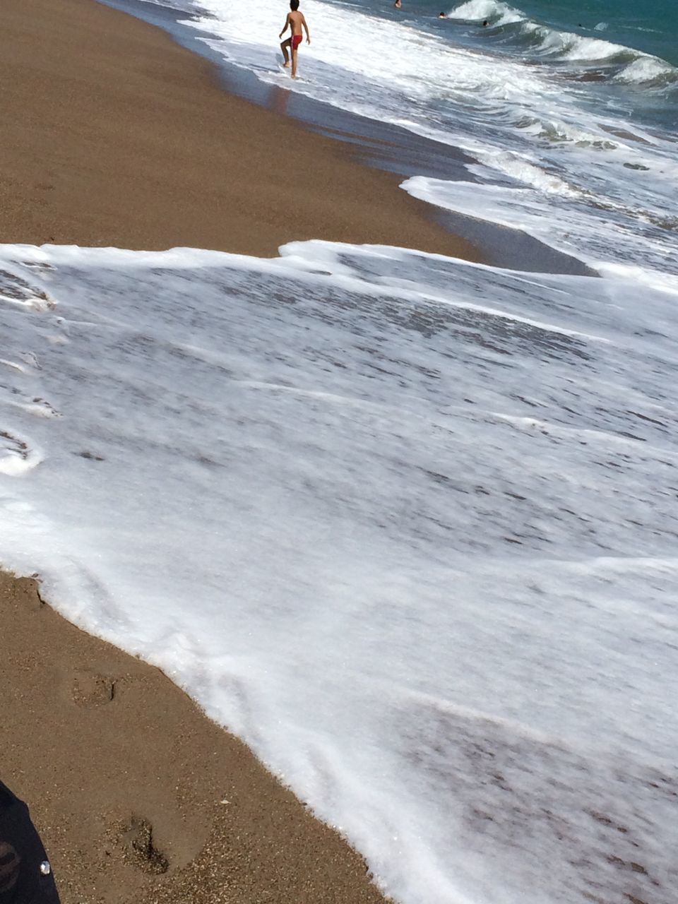 beach, sand, shore, sea, water, wave, lifestyles, leisure activity, surf, low section, walking, vacations, men, footprint, tourist, tide, person, motion