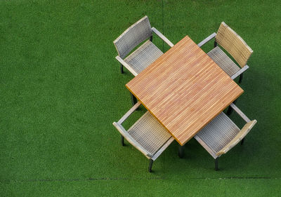 Empty table on green grass