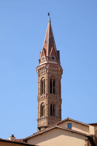 Bell tower of the badia fiorentina church in florence, tuscany, italy