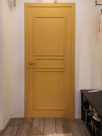 Closed wooden door of building