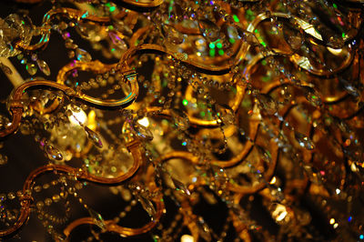 High angle view of raindrops on illuminated glass