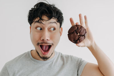 Portrait of man against white background