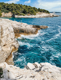 Scenic view of rocks in sea