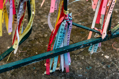 Colored ribbons of senhor do bonfim tied to an iron gate in pelourinho.