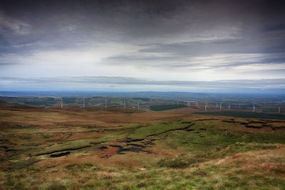 View of landscape against cloudy sky