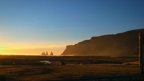 Scenic view of sea at sunset